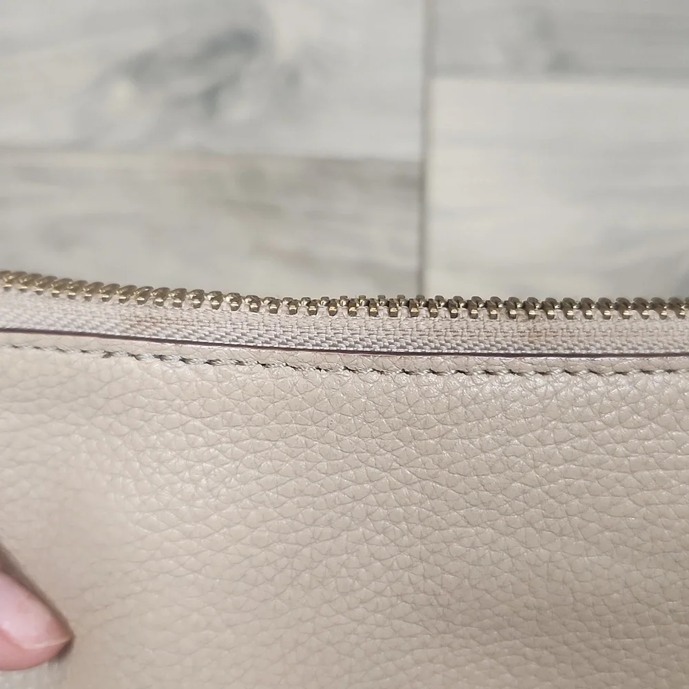 Kate Spade Leather Cream Wristlet with Navy Blue Interior‎